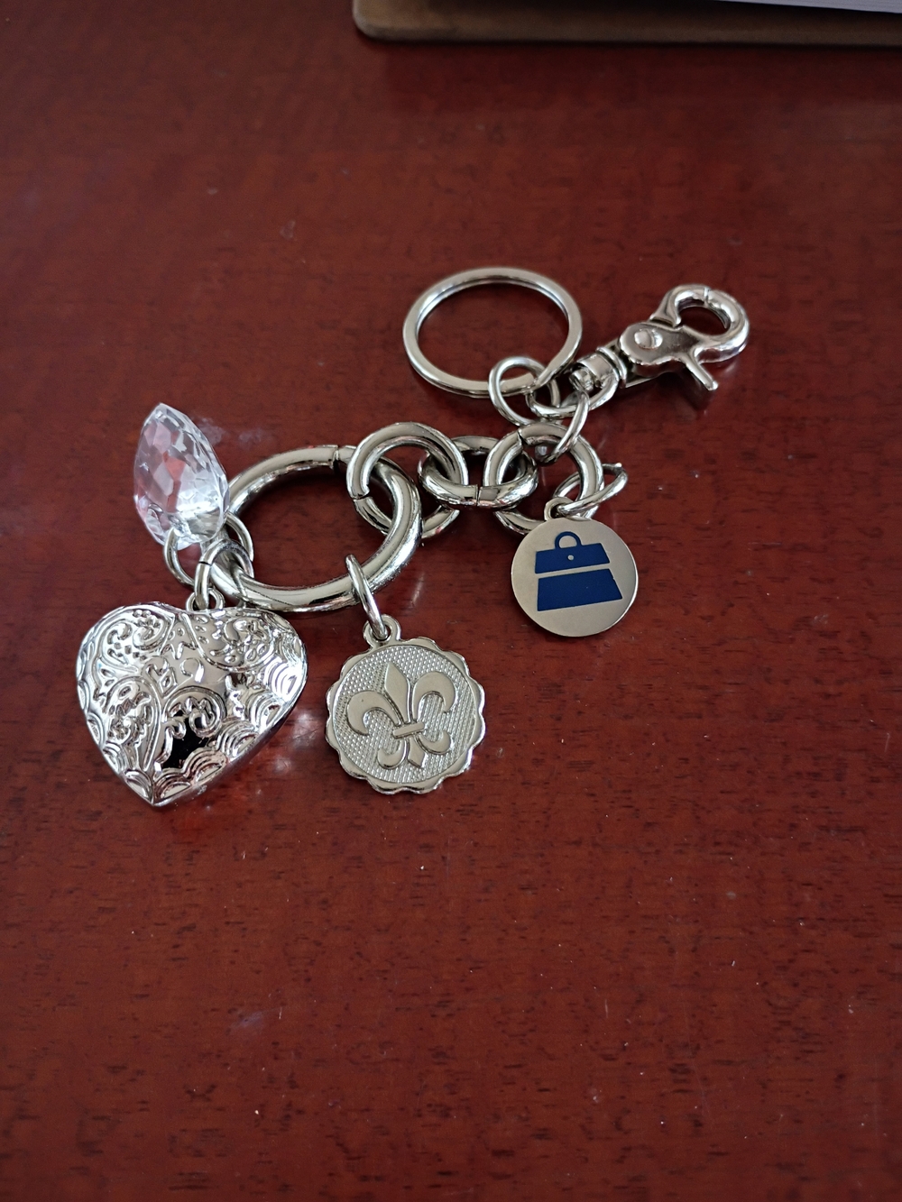 Kathy Van Zeeland Silver-Tone Heart & Fleur Keychain with Blue Accent